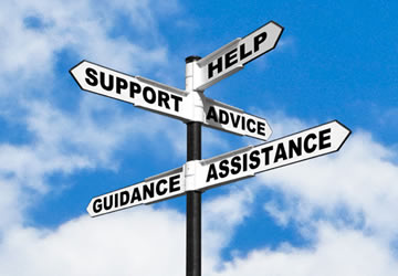 Photo illustration of sign post with Help, Support, Advice, Guidance, and Independence